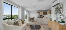 Top-Floor Living with Iconic Mount Views