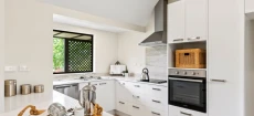 Elevated 2-bed unit with garden view