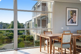Communal dining and lounge area at Lady Allum Retirement Village